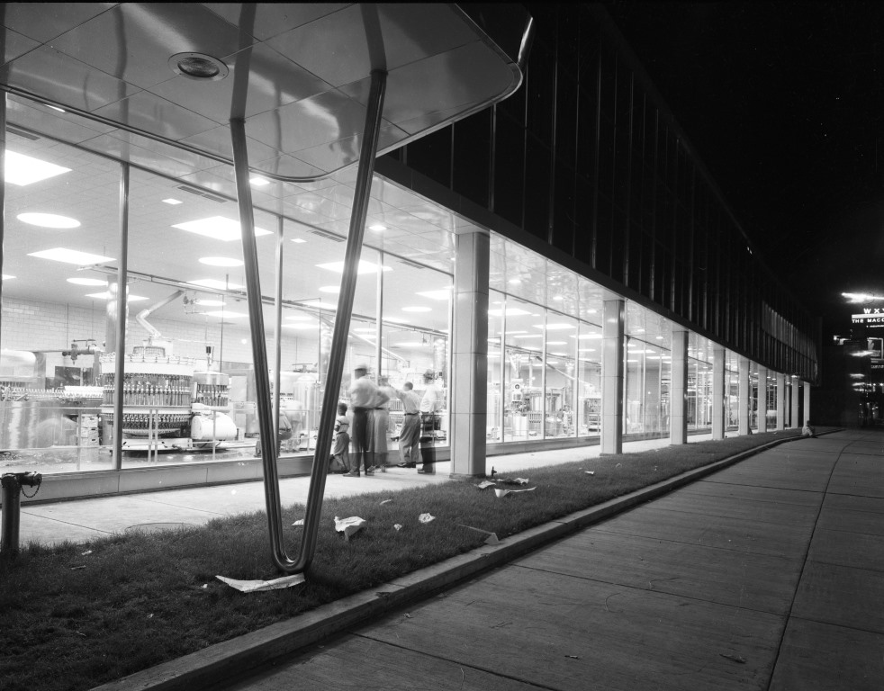 Glass walls allowed passersby to observe the bottling works in action, c. 1955.