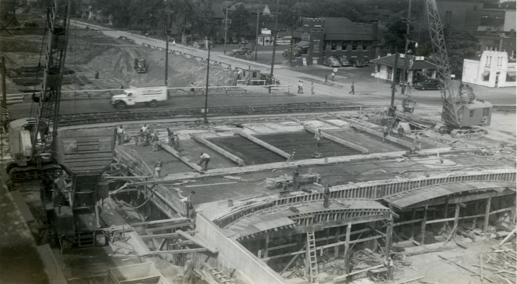 Pouring concrete pavement on the east half of Woodward Avenue bridge deck.