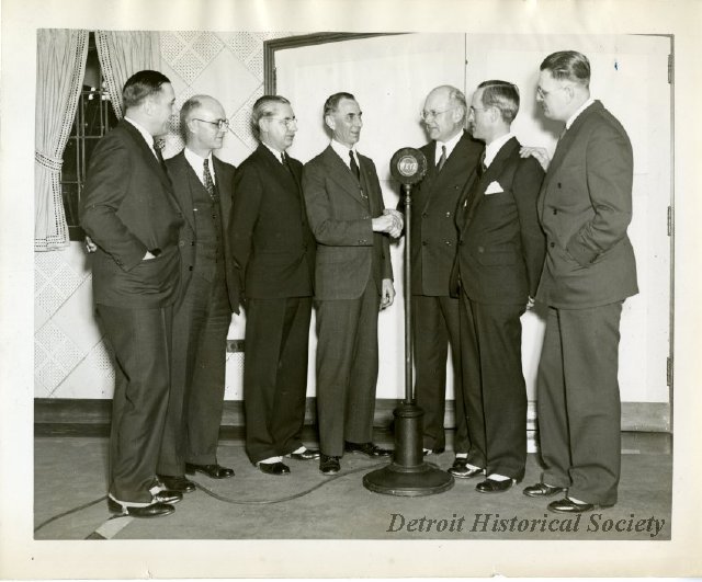 Photo showing George W. Trendle behind the microphone, 1933 - 2012.032.004